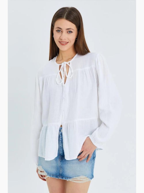 Chemise en seersucker à manches trois-quarts et col ras du cou avec détails de reliure mixray - Kiabi Chemise en seersucker à manches trois-quarts et col ras du cou avec détails de reliure mixray - Kiabi