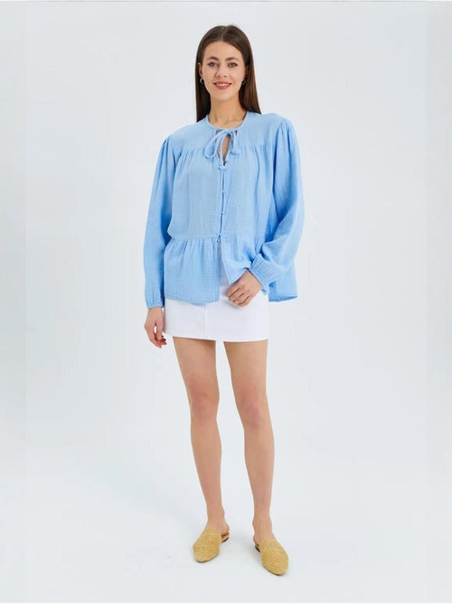 Chemise en seersucker à manches trois-quarts et col ras du cou avec détails de reliure mixray - Kiabi Chemise en seersucker à manches trois-quarts et col ras du cou avec détails de reliure mixray - Kiabi