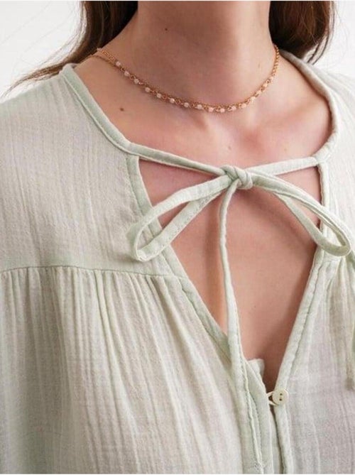 Chemise en seersucker à manches trois-quarts et col ras du cou avec détails de reliure mixray - Kiabi Chemise en seersucker à manches trois-quarts et col ras du cou avec détails de reliure mixray - Kiabi