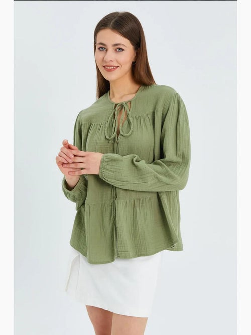 Chemise en seersucker à manches trois-quarts et col ras du cou avec détails de reliure mixray - Kiabi Chemise en seersucker à manches trois-quarts et col ras du cou avec détails de reliure mixray - Kiabi