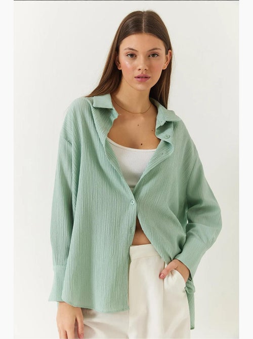 Chemise froissée basique surdimensionnée à épaules dénudées lucci - Kiabi Chemise froissée basique surdimensionnée à épaules dénudées lucci - Kiabi