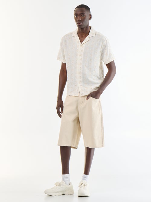 Chemise manches courtes en maille fantaisie avec broderies - Kiabi Chemise manches courtes en maille fantaisie avec broderies - Kiabi