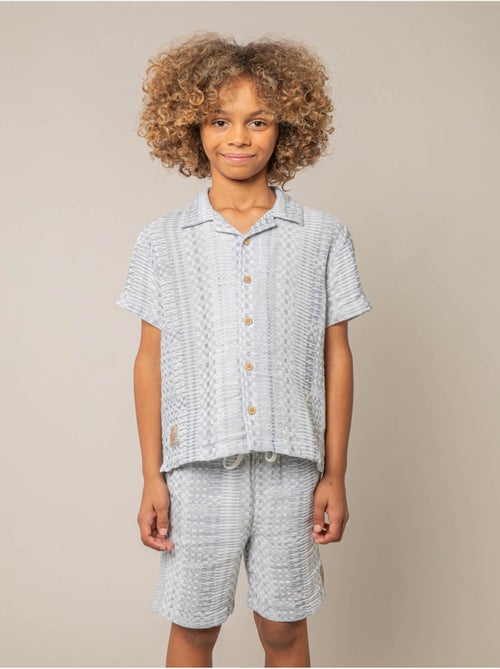 Chemise manches courtes garçon en coton jacquard 'Deeluxe' - Kiabi Chemise manches courtes garçon en coton jacquard 'Deeluxe' - Kiabi