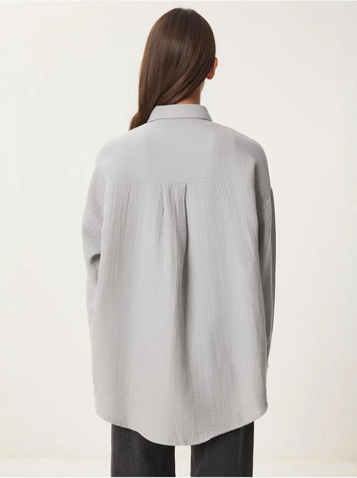 Chemise oversize en coton texturé avec poche istanbul - Kiabi Chemise oversize en coton texturé avec poche istanbul - Kiabi