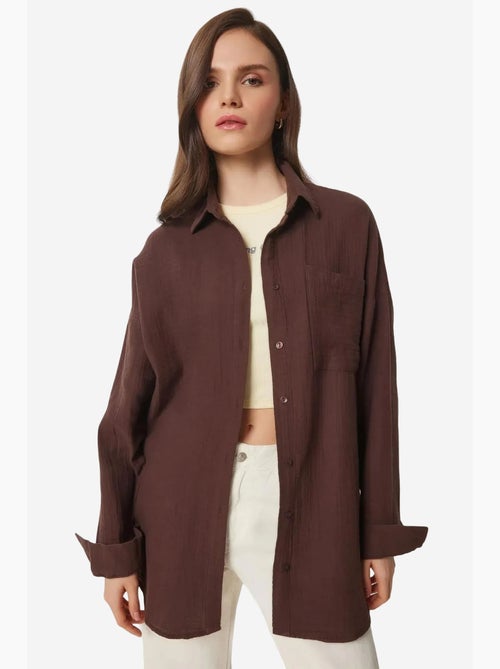 Chemise oversize en coton texturé avec poche istanbul - Kiabi Chemise oversize en coton texturé avec poche istanbul - Kiabi