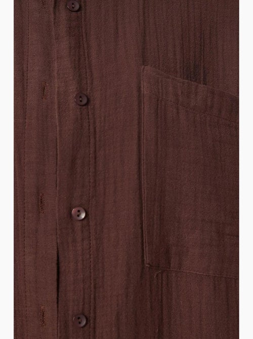 Chemise oversize en coton texturé avec poche istanbul - Kiabi Chemise oversize en coton texturé avec poche istanbul - Kiabi