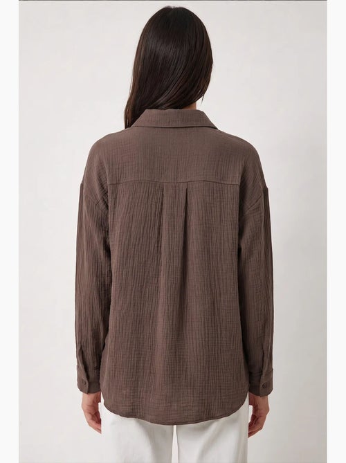 Chemise oversize en coton texturé avec poche istanbul - Kiabi Chemise oversize en coton texturé avec poche istanbul - Kiabi