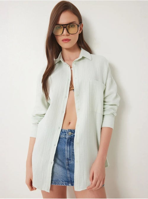 Chemise oversize en coton texturé avec poche istanbul - Kiabi Chemise oversize en coton texturé avec poche istanbul - Kiabi