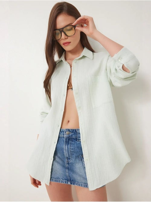 Chemise oversize en coton texturé avec poche istanbul - Kiabi Chemise oversize en coton texturé avec poche istanbul - Kiabi