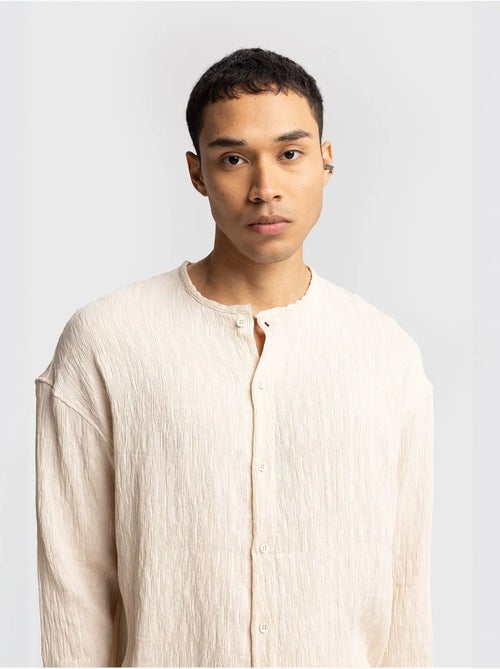Chemise texturée à manches longues et col rond giesto - Kiabi Chemise texturée à manches longues et col rond giesto - Kiabi