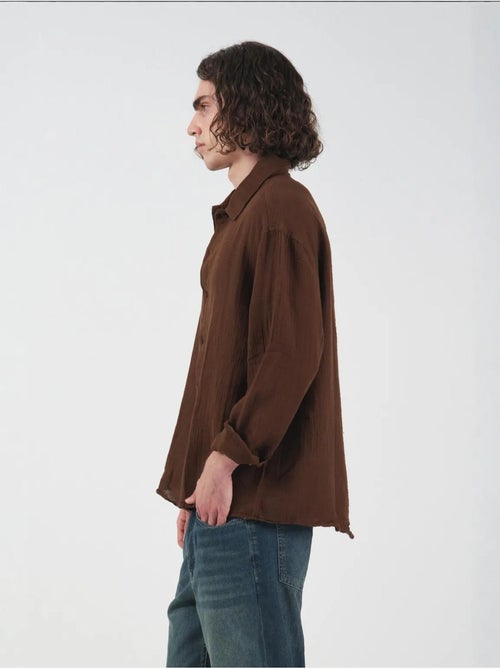 Chemise texturée tissée à manches longues et boutonnée giesto - Kiabi Chemise texturée tissée à manches longues et boutonnée giesto - Kiabi