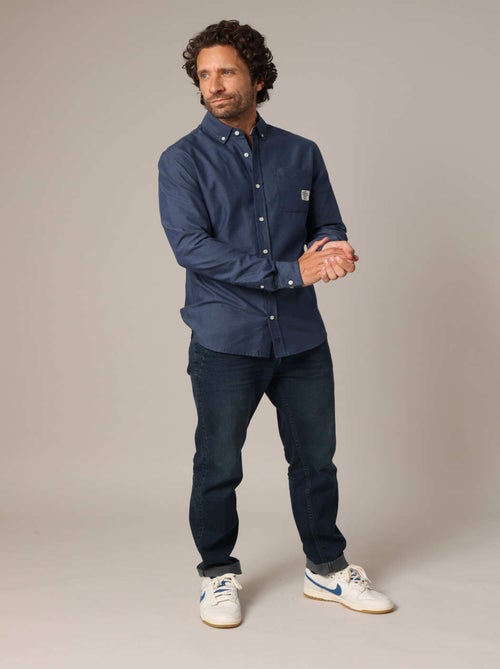 Chemise unie avec poche plaquée ornée d'un patch signature. 'Deeluxe' - Kiabi