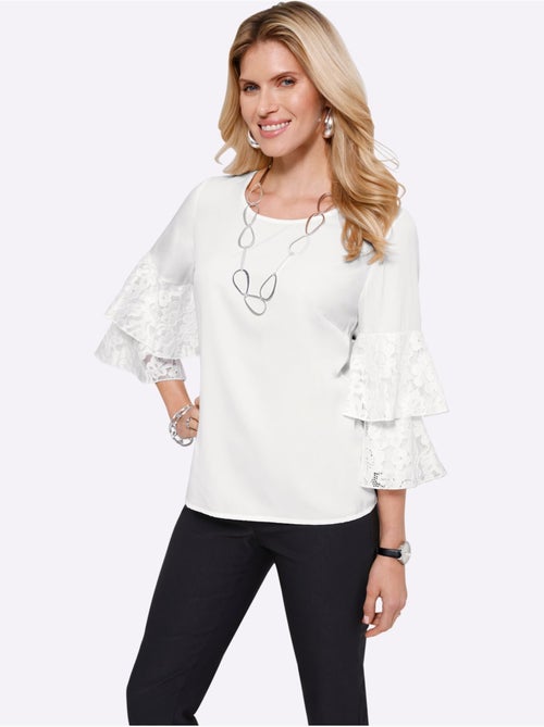 Chemisier avec manches trompette en dentelle et encolure ronde - taille standard - moda vilona - Kiabi Chemisier avec manches trompette en dentelle et encolure ronde - taille standard - moda vilona - Kiabi