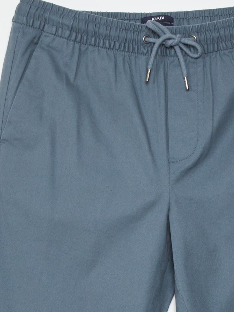 Pantalon de survêtement coupe-vent rayé bleu marine