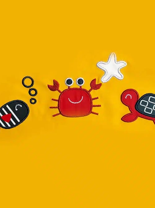 Ciré imperméable bébé avec Capuche 'Breizh Ocean', Poncho Intérieur rayé avec Broderie - Kiabi