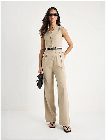 Combinaison à col en v et ceinture à jambes larges avec poches bianco lucci