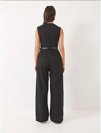 Combinaison à col en v et ceinture à jambes larges avec poches bianco lucci