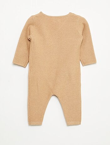 Combinaison en tricot avec ouverture cache-cœur