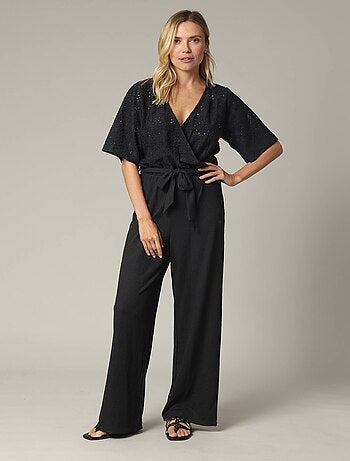 Combinaison femme noire cache-cœur avec maille fantaisie 'Deeluxe'