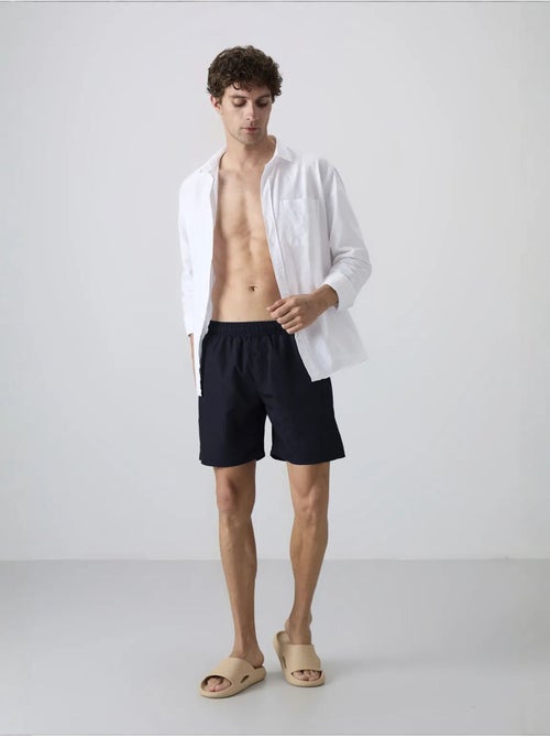 Combinaison homme à short à enfiler tommy - Kiabi Combinaison homme à short à enfiler tommy - Kiabi