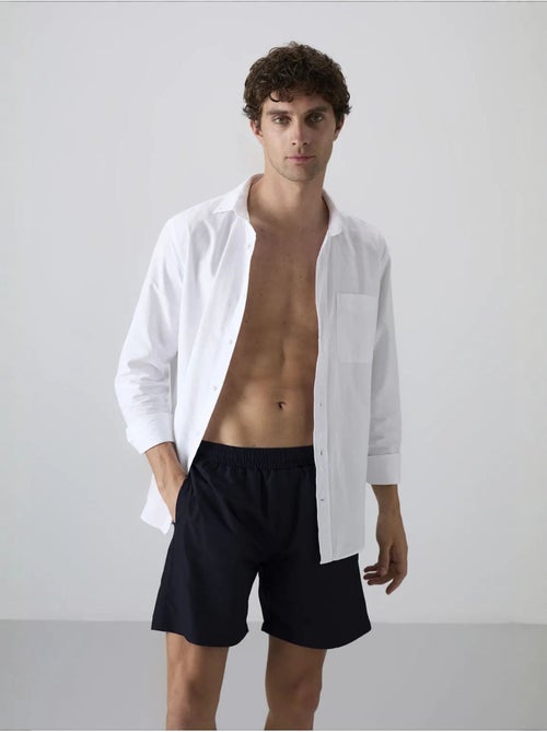 Combinaison homme à short à enfiler tommy - Kiabi Combinaison homme à short à enfiler tommy - Kiabi