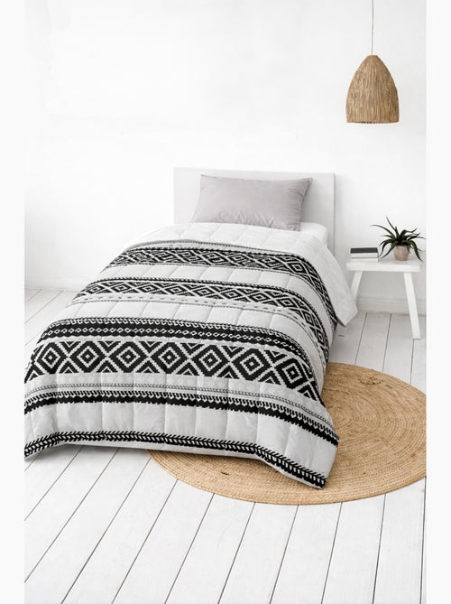 Couette légère imprimée / Non tissé blanc - Kiabi Couette légère imprimée / Non tissé blanc - Kiabi
