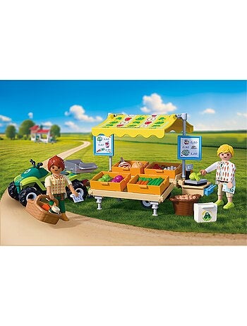 Country Stand de légumes au marché et quad