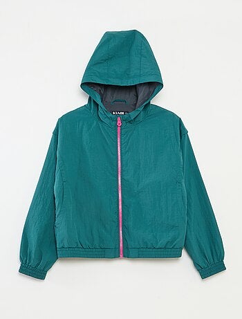 Coupe vent à capuche avec base élastiquée