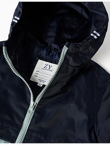 Coupe-vent à capuche et poches