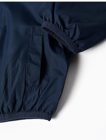 Coupe-vent avec capuche et poches