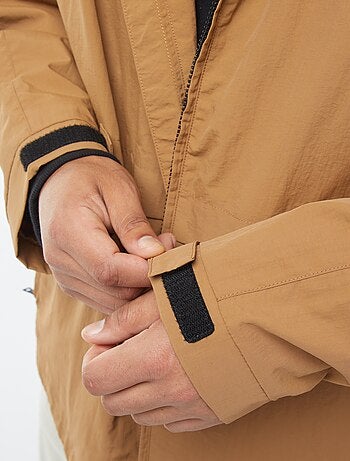 Coupe-vent imperméable à capuche avec manches amovibles