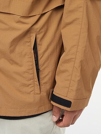 Coupe-vent imperméable à capuche avec manches amovibles
