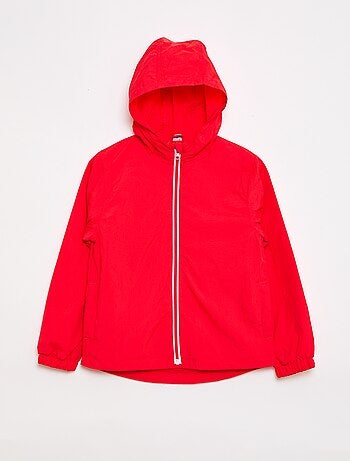 Coupe-vent uni pliable dans sa capuche