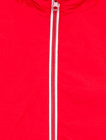 Coupe-vent uni pliable dans sa capuche