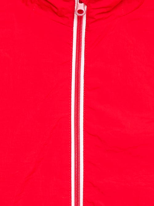 Coupe-vent uni pliable dans sa capuche - Kiabi