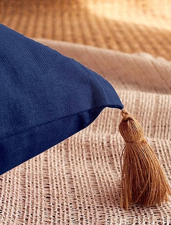 Coussin avec pompons en jute
