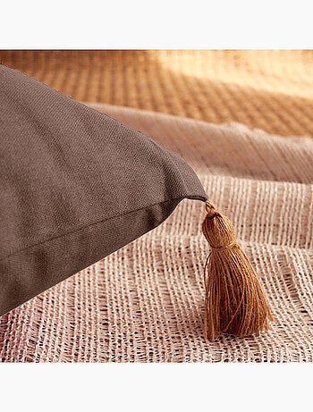 Coussin avec pompons en jute