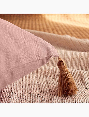 Coussin avec pompons en jute