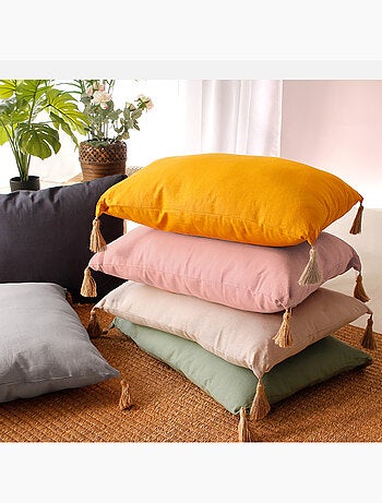 Coussin avec pompons en jute