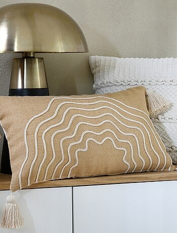 Coussin beige rectangulaire avec relief
