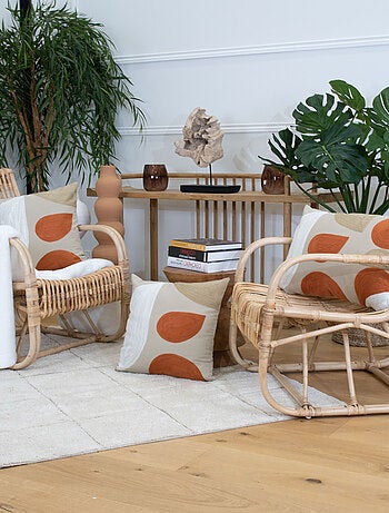 Coussin brodé motif abstrait