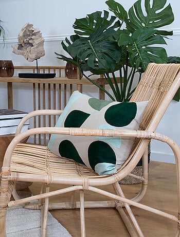 Coussin brodé motif abstrait