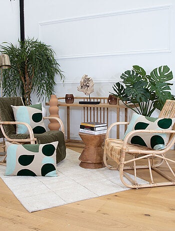 Coussin brodé motif abstrait