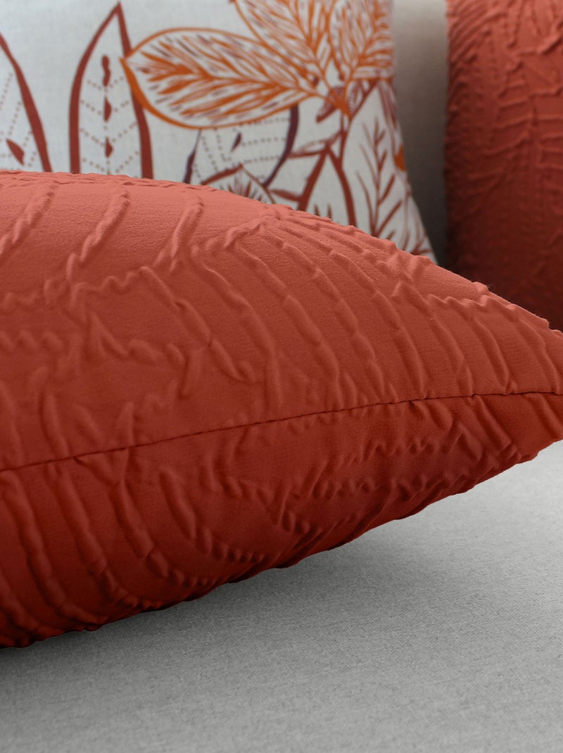 Coussin carré feuillage aspect gaufré Rouge cerise - Kiabi