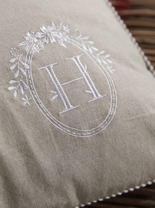 Coussin déhoussable avec broderie coton uni CHARME - Kiabi