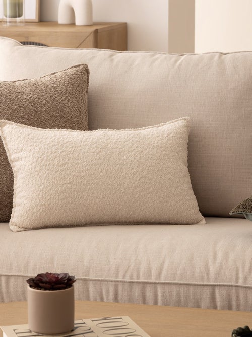 Coussin déhoussable bouclette rectangle - Kiabi Coussin déhoussable bouclette rectangle - Kiabi