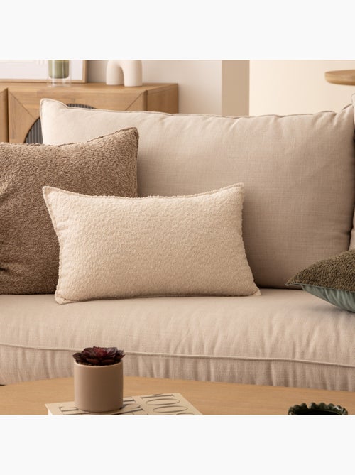 Coussin déhoussable en bouclette SOANA - Kiabi Coussin déhoussable en bouclette SOANA - Kiabi