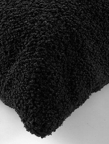 Coussin déhoussable en bouclette unie
