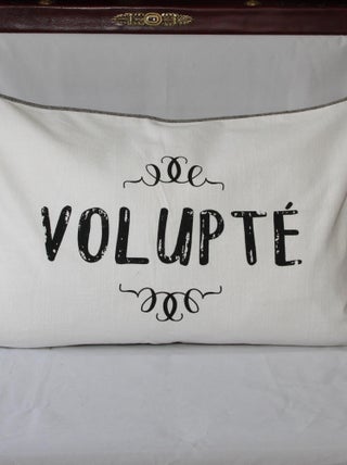 Coussin déhoussable et passepoilé