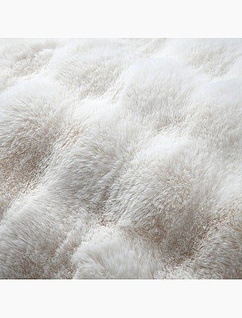 Coussin déhoussable imitation fourrure
